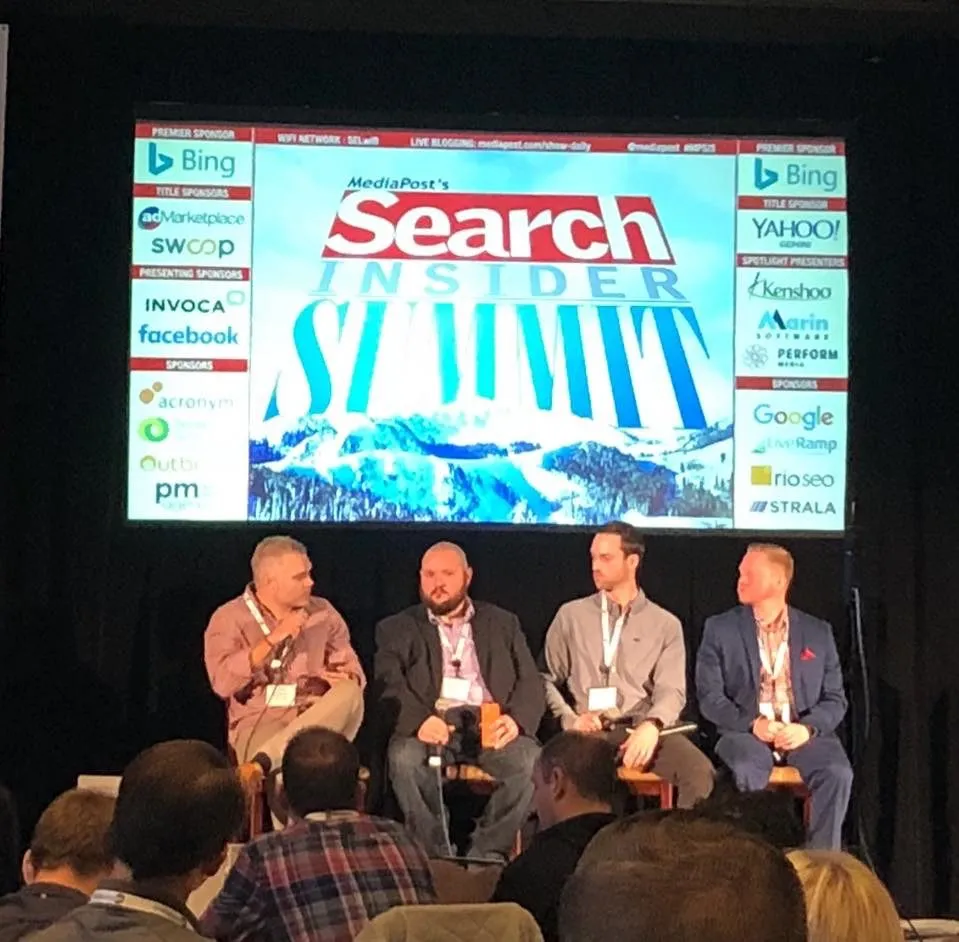 Bryant Garvin on the MediaPost Search Insider Summit panel, with the Search Insider Summit screen behind the group.